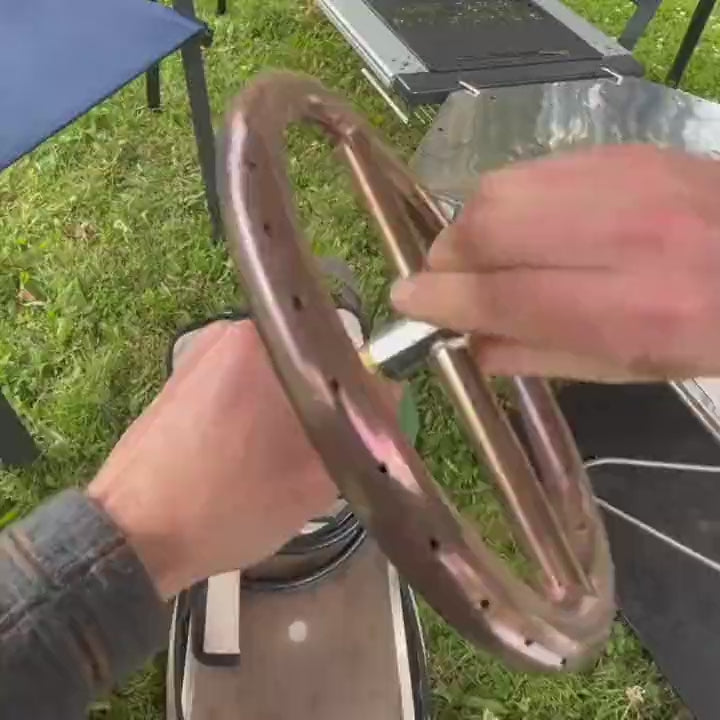 POV video showing the Zutto SP1 propane gas adapter being assembled, placed in a Snow Peak Takibi fire pit, and lit for smokeless flame