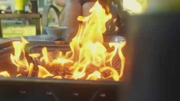 Slow motion video of the Zutto SP1 smokeless propane gas adapter burning in a Snow Peak Takibi fire pit with bright natural flames and no visible smoke